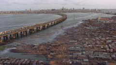 The slums covering the lagoon, seen in the foreground